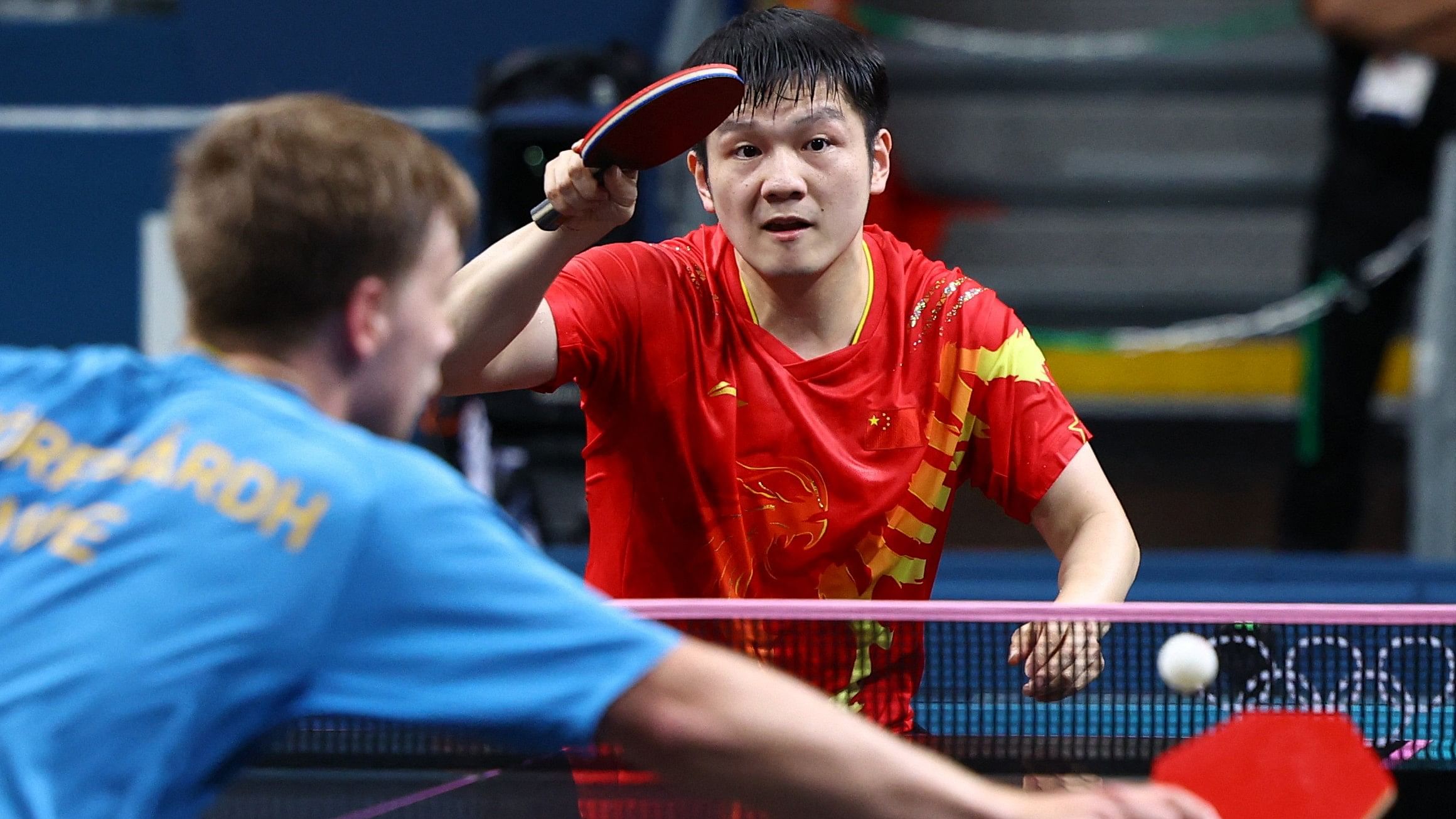 <div class="paragraphs"><p>Zhendong Fan of China in action during his gold medal match against Truls Moregard of Sweden.</p></div>